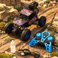 Remote control off-road toy car navigating rocky terrain