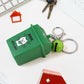 Close-up view of mini bin keychain showcasing durable plastic construction