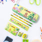 Top view of complete dinosaur kids stationery set with all items displayed