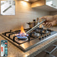 Manual gas stove spark lighter with long stainless steel handle for kitchen use