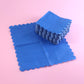 Royal scalloped paper napkin with elegant scalloped edges on party table