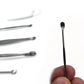 All six stainless steel earwax removal tools neatly arranged on a clean white background.