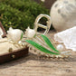 Hair claw clip floral design with pearl accent securing hair