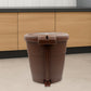 Side view of a white mini pedal dustbin, highlighting its convenient foot pedal.