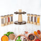 A cook using the 360° rotating kitchen spice rack to season a dish.