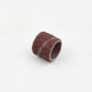 A mandrel for rotary tools, demonstrating how sanding sleeves attach.