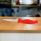 Close-up of stainless steel serrated blade for vegetable cutting