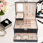 Interior view of the velvet-lined jewellery box, with ring rolls and earring card.