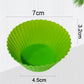 Assortment of freshly baked cupcakes in a non-stick silicone mould.