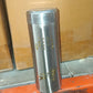 The 380ml stainless steel travel bottle placed on a desk.