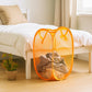 Close-up of breathable mesh fabric on the lightweight laundry hamper