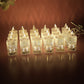 Multiple LED flameless decorative candles arranged showing crystal pattern and warm glow