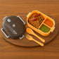 Reusable leak-proof food container with integrated spoon