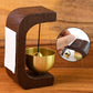 Zen Bell displayed as a decorative wooden and brass meditation chime