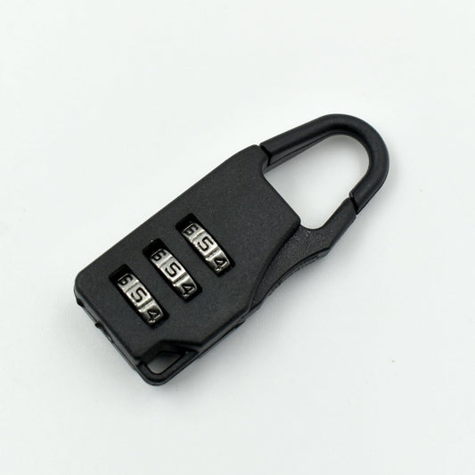 A sleek black 3-digit luggage lock securely attached to a suitcase zipper.