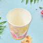 A hand holding one of the sturdy disposable tea coffee cups, showcasing its design.