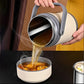 Open portable food warmer showing its spacious 2L capacity and removable liner.