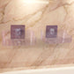 Transparent soap dish with slotted base allowing water drainage to keep soap dry