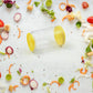 Close-up of the premium quality glass and ABS construction of the salt dispenser bottle.