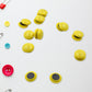 Assorted magnetic particle circles used for teaching and organizing notes.