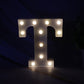 Close up of decorative LED lamp shaped as letter T
