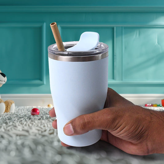 Stainless steel insulated coffee mug featuring a wooden straw for hot and cold drinks
