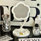 Decorative flower-shaped desktop mirror enhancing room beauty and function