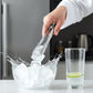 Multipurpose kitchen tools including garlic crusher, tongs and spatula