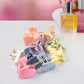 Variety of mini butterfly hair claws in different colours from the 6-piece set.