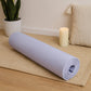 Yoga mat rolled for travel and home fitness use