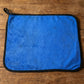 Lifestyle image of a clean glass surface wiped with microfiber cloth
