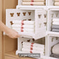 The kitchen pantry storage cart filled with various food items and essentials.
