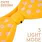 Close-up of LED glowing bow hairband showcasing polka dot design