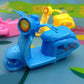 Side view of durable bike shaped pencil sharpener with creative design