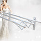 Side view of the wall-mounted foldable clothes airer, compact when not in use.