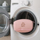 Hand holding the soft 3D air-mesh material of the laundry bag.