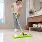 Microfiber mop with an extendable handle reaching high corners for comprehensive cleaning.