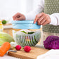 The ChopFresh 60 Seconds Bowl being used as a strainer to wash vegetables.