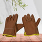 Detailed view of the reinforced palm and fingers of the puncture-resistant gardening gloves.