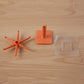 Orange multi-hook kitchen utensil hanger from different angle