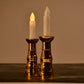 A pair of decorative flameless LED candle lights creating a warm ambiance.