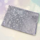 Polka dot pattern on silver luxury gift wrapping paper sheets