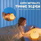 Front view of the smiling pear silicone night lamp.