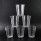 Crystal-clear Plastic Ringo Glass filled with chilled beverage on table