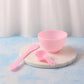 Facial mask mixing bowl accompanied by spatula and measuring spoon