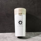 Portable coffee travel flask made of vacuum insulated stainless steel