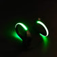 A pair of LED shoe clip lights, showcasing their compact design.
