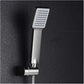 Person holding the handheld shower head, demonstrating its easy grip and versatile use.