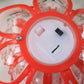 Flameless LED candle in lotus design creating warm ambiance