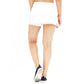 Close-up of wide elastic waistband on women's athletic skort.